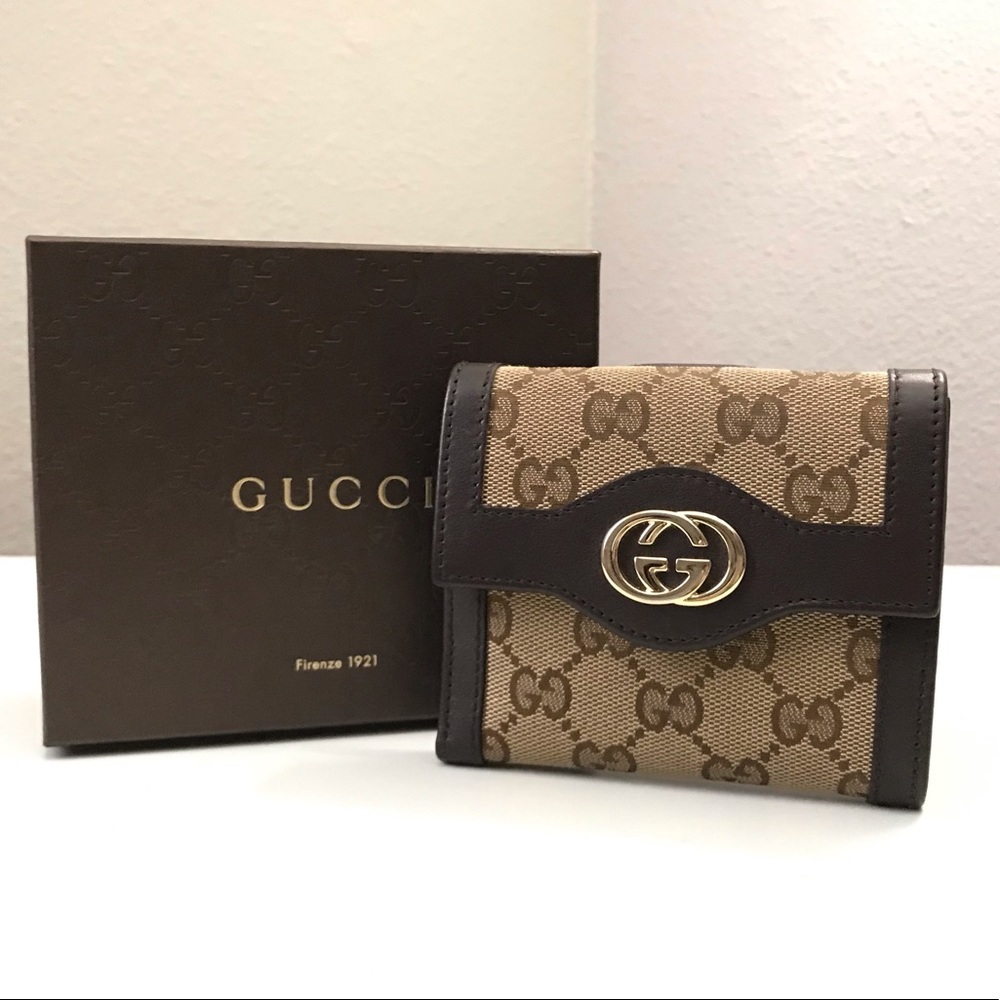 Clearing out closet for remodel. Beautiful NWT Gucci Billfold Wallet.